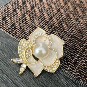 Elegant Gold and White Floral Brooch